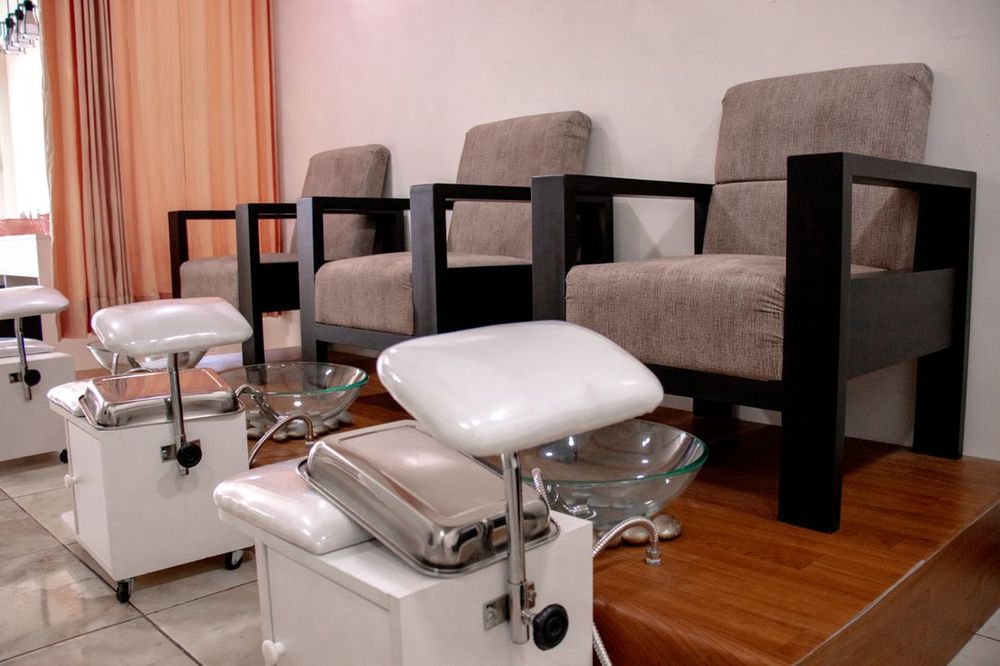 Pedicure lounge chairs in warm light